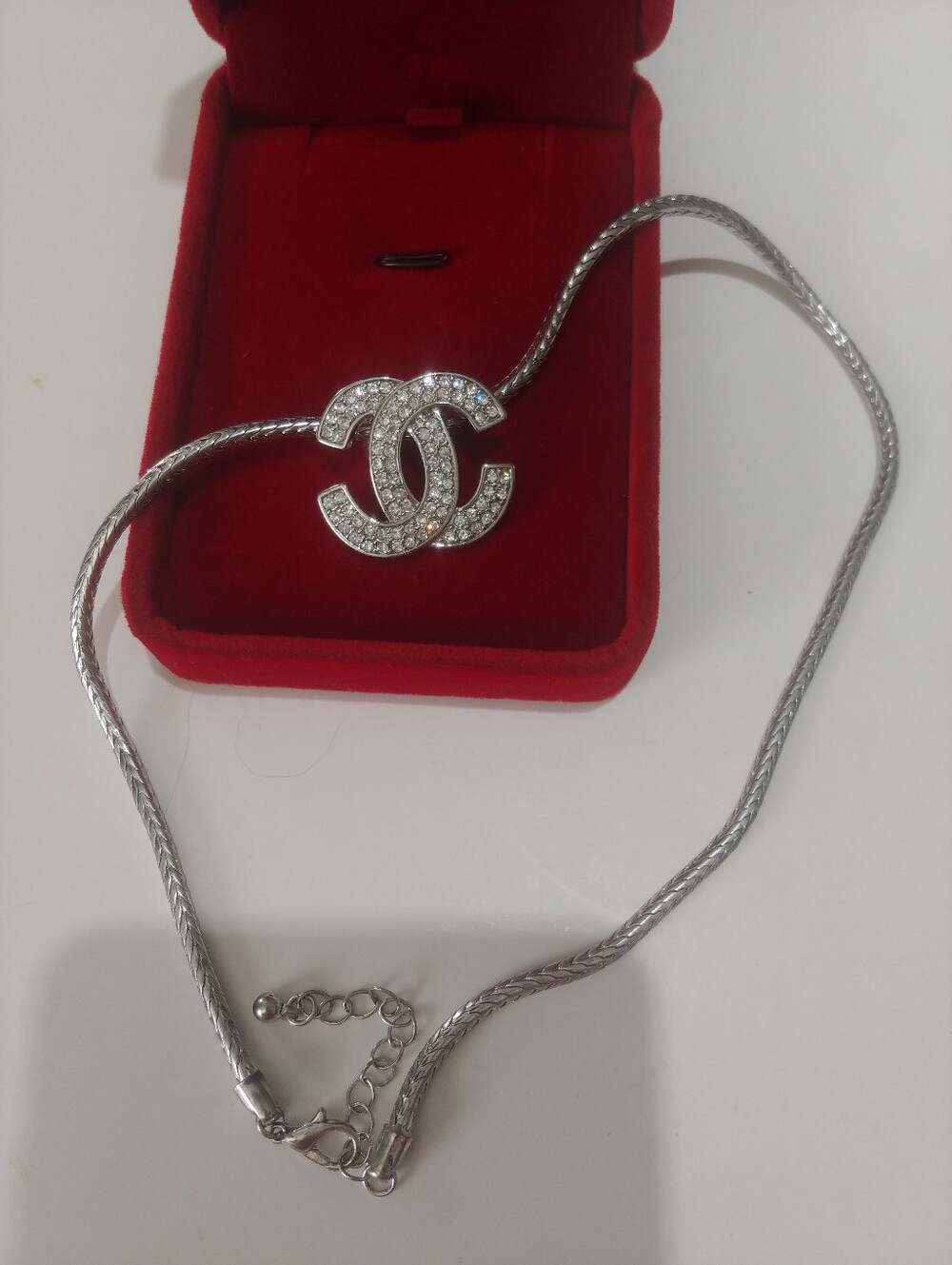 Designer-Inspired Silver Crystal Interlocking Pendant Necklace - Picture 2 of 8